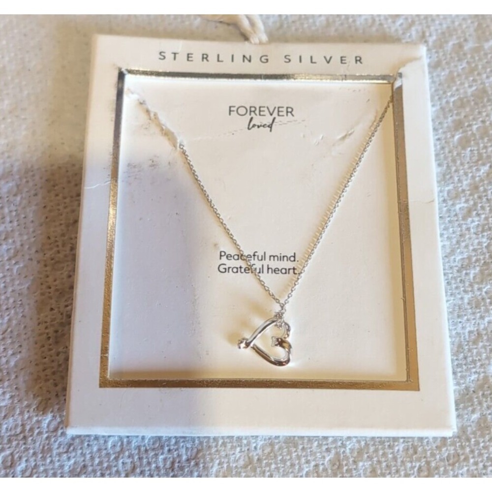 A new Day Necklace 18in L  silver heart